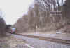 Zug nach Kln-Hansaring passiert Doppelmasten beim ehem. Hp. Gummersbach-Nord, Blick in Richtung Nord-Ost (13.3.2004), (c) Alex M.